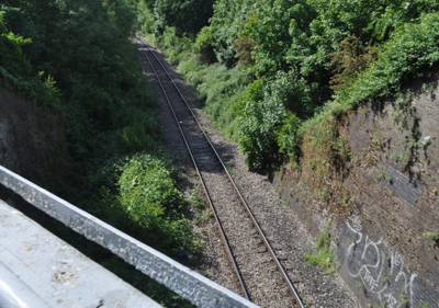 Three Bridges - railway below, Norwood Green Single-track railway in cutting below