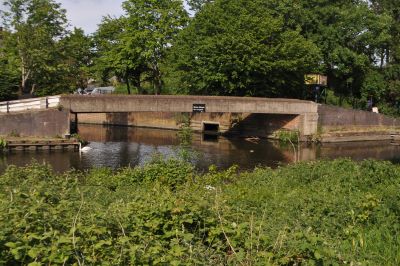 archive image of river Brent at Hanwell locks Footbridge over river with barges in the foreground